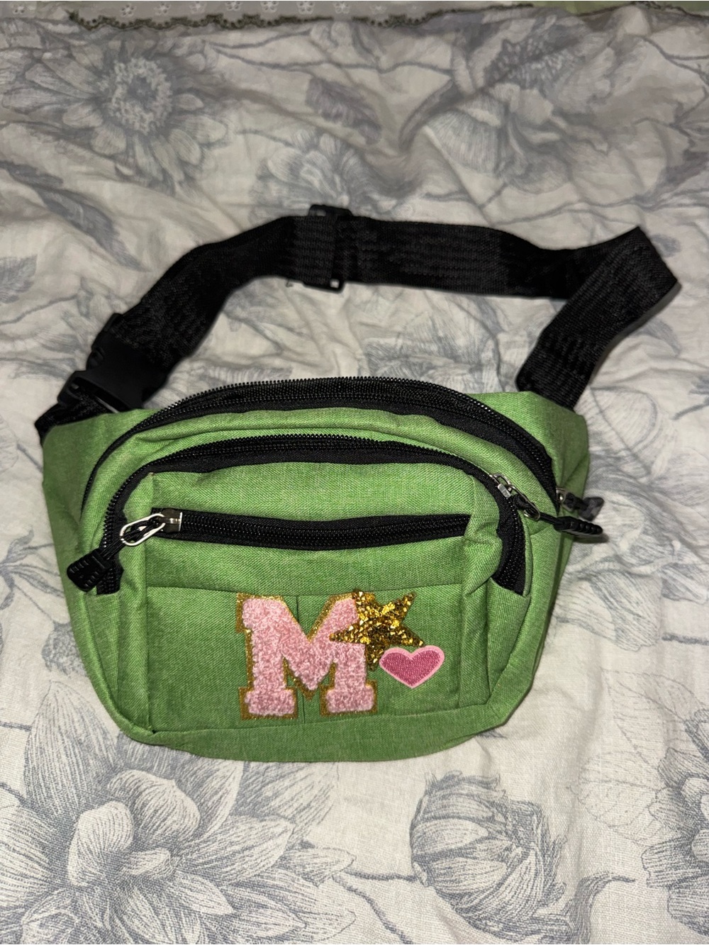 Green Waist Bag with Pink 'M' and Gold Star Accent
